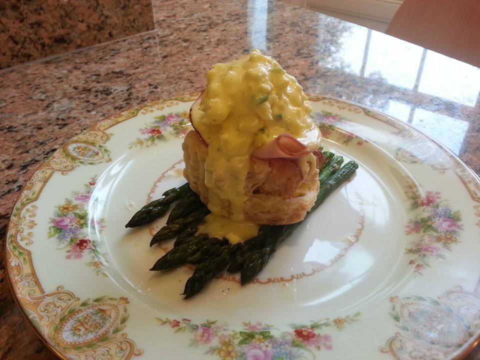 Belle Grove Plantation Eggs Benedict withCream Cheese Scrambled Eggs and Virignia Ham in Puff Pastry on Roasted Asparagus with Fresh Hollandaise Sauce at Belle Grove Plantation Bed and Breakfast 